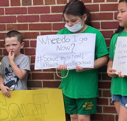 Children protest the school\'s closure outside St. Paul the Apostle in Yonkers.