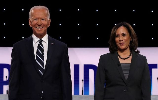 July 31, 2019: Joe Biden and Kamala Harris take the stage at the Democratic Presidential Debate at the Fox Theatre in Detroit, Michigan. 