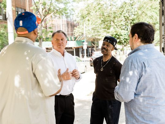 John Cummings chats to constituents in the 14th District.