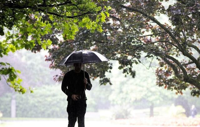 August 19, 2020: A person walking through Dublin City during heavy rain as the country braces itself for Storm Ellen which will track across the country later this evening.