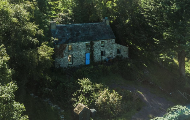 The 200-year-old stone cottage, at Canfie Tuosist, Kenmare, County Kerry.