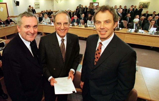 April 10, 1998: Taoiseach Bertie Ahern, US Senator George Mitchell, and British Prime Minister Tony Blair at Castle Buildings in Belfast after they signed the peace agreement.