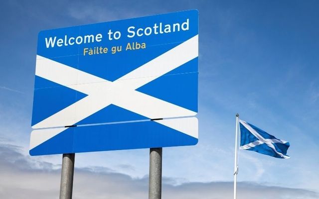 A \"Welcome to Scotland\" sign featuring a Gaelic translation. 