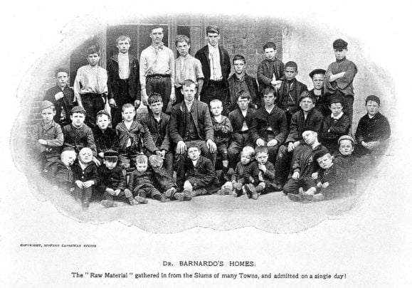 Dr. Barnardo\'s home! Children gathered outside one of Barnardo\'s homes.