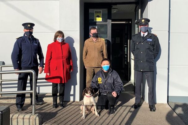 (L to R) Inspector Sean Leahy, \"Ruby\" with her owners Bernard & Liz Ahern, Detective Garda Michelle Quinn, and Superintendent Adrian Gamble.
