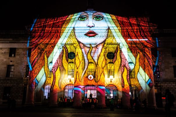 Trinity College Dublin lit up by the 2021 Herstory Light Show