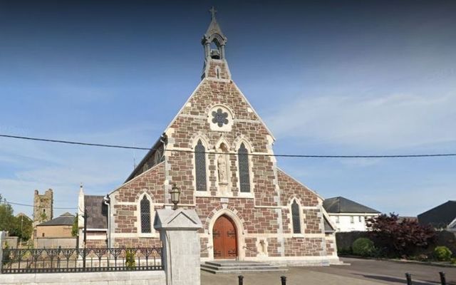 Vasile fished for envelopes in the collection box at St. Mary\'s Church in Carrigtwohill.