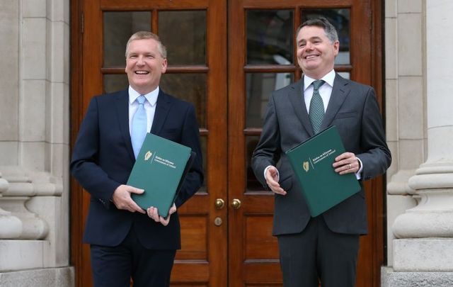 October 12, 2021: Minister for Public Expenditure and Reform Michael McGrath and Minister for Finance Paschal Donohoe outside Government Buildings before presenting Budget 2022 to Cabinet. 
