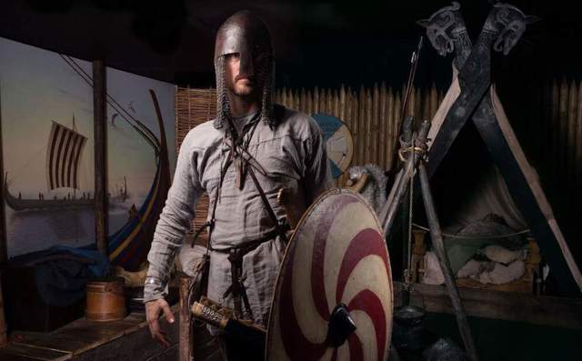 An actor at Dublinia, a Viking experience in Dublin city center, dressed as a Viking. 