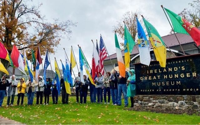 Community members outside Ireland\'s Great Hunger Museum in Connecticut protesting the closure of the institution