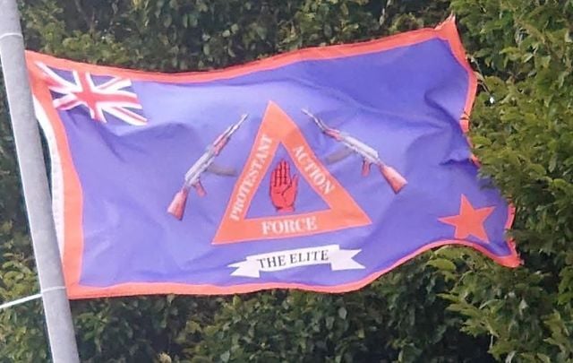 The flag of the Protestant Action Force flying from a lamppost in Dundonald in Belfast.
