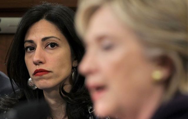 October 22, 2015: Huma Abedin (L), looks on as Hillary Clinton testifies before the House Select Committee on Benghazi on Capitol Hill in Washington, DC.