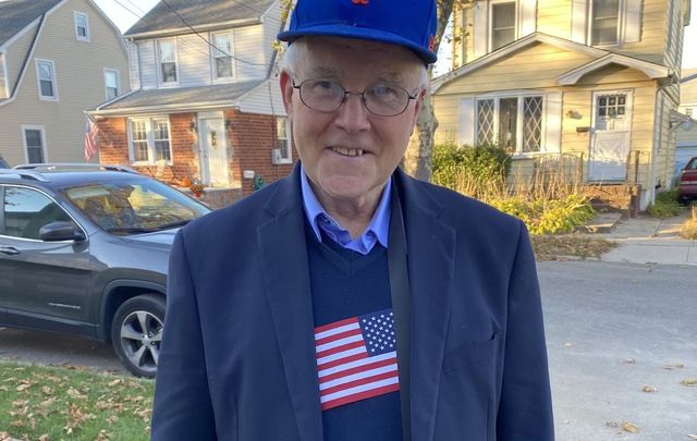 Father John Egan on Monday afternoon outside his brother’s home in Williston Park, Long Island.