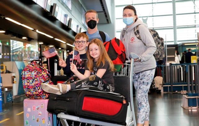November 8, 2021: Laren and Ryan McShane from Tyrone with their children Malachy and Orla check in at the Aer Lingus desk in Dublin Airport before flying to New York as Aer Lings welcomed customers back on board its long-haul service to the United States.