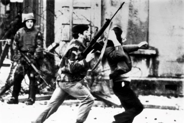 January 30, 1972: An armed soldier attacks a protestor on Bloody Sunday when British Paratroopers shot dead 13 civilians on a civil rights march in Derry City.