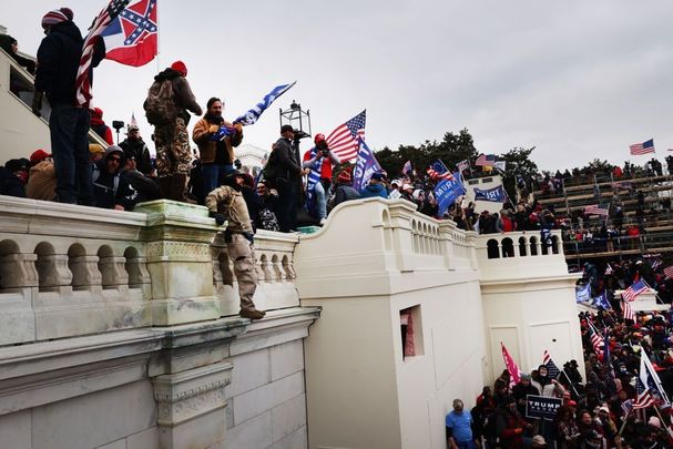 January 6, 2021: Thousands of Donald Trump supporters storm the United States Capitol building following a \"Stop the Steal\" rally in Washington, DC. The protesters stormed the historic building, breaking windows and clashing with police. Trump supporters had gathered in the nation\'s capital to protest the ratification of President-elect Joe Biden\'s Electoral College victory over President Trump in the 2020 election. 