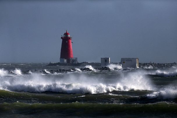 Storm Barra hits land in Ireland (photograph of Poolbeg lighthouse, Dublin, taken in 2020)