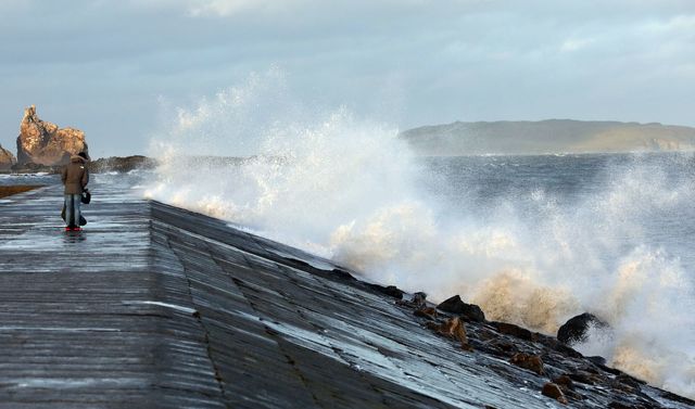 Waves crash in Howth, north Dublin, during Storm Barra.