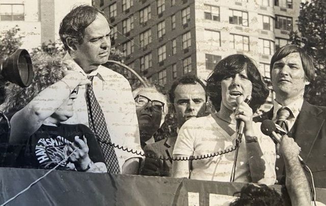 Maura McDonnell speaking at Lincoln Center for her brother Joe who was on hunger strike. Also are the platform are Assemblyman John Dearie, TV commentator Dr. Martin Abend, Malachy McCreesh, and Martin Galvin.