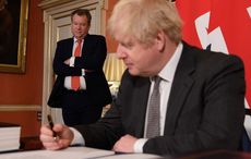 Britain’s hardline Brexit negotiator quits, raising hopes of a deal