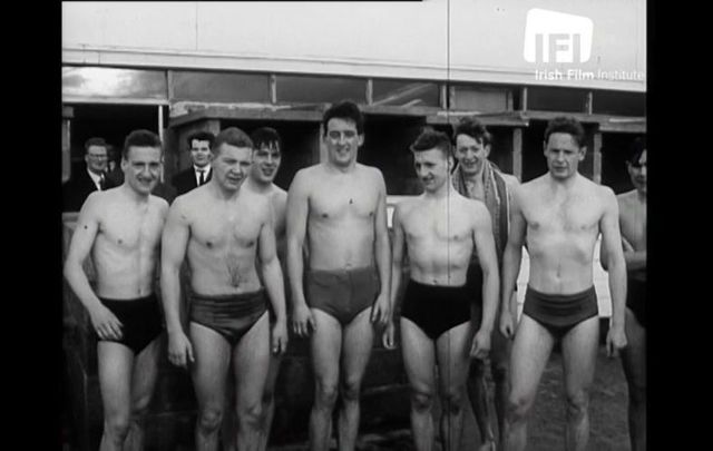 Brave Dubliners prepare to dive into Clontarf Baths on Christmas morning, 1961