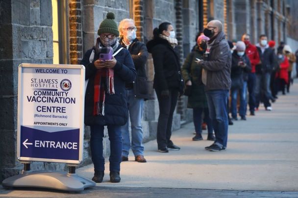 December 24, 2021: People queuing outside Richmond Barracks in Dublin, as the clinic continues to roll out booster vaccinations just one day before Christmas