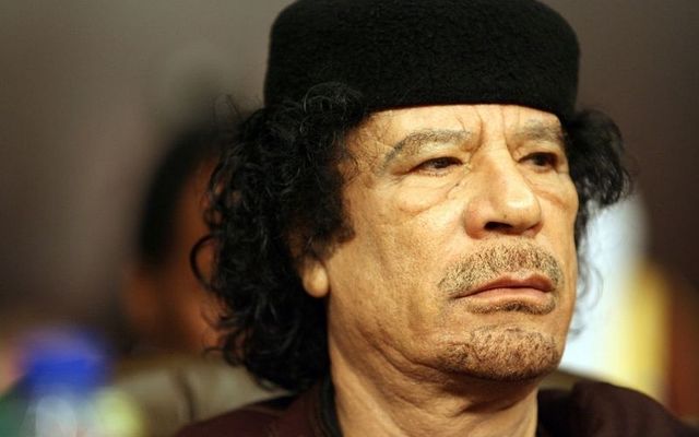 Colonel Muammar Gaddafi attends the opening of the Arab Summit on March 29, 2008, in Damascus, Syria. 