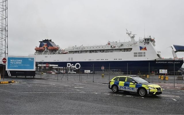 Police at Larne after sectarian messages threatened workers at the Northern Irish port