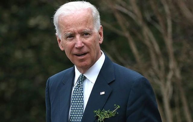  March 14, 2014: Then-Vice President Joe Biden waits for the arrival of Taoiseach Enda Kenny at the Naval Observatory in Washington, DC. 