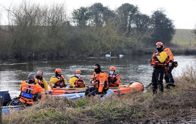 March 2, 2021: Members of local Civil Defence Emergency Services near Ardreigh Lock on the River Barrow outside Athy, County Kildare. 
