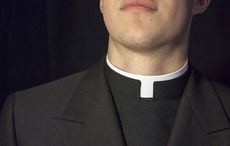 Dublin priest ordered by police to stop administering Holy Communion in church