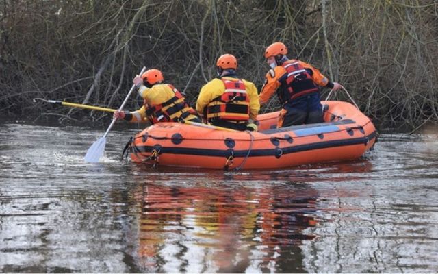 Members of the Civil Defence Emergency Services searching for Declan Reid\'s body. 