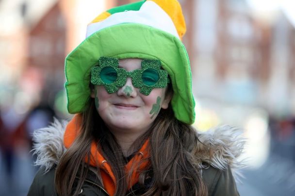 March 17, 2019: A child enjoying the St. Patrick\'s Day Parade in Dublin, Ireland.