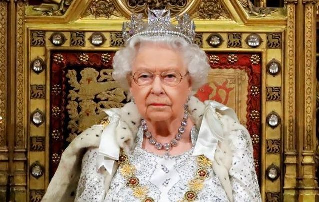 October 14, 2019: Queen Elizabeth II sits in The Sovereign\'s Throne in the House of Lords during the State Opening of Parliament in the Houses of Parliament in London, England.