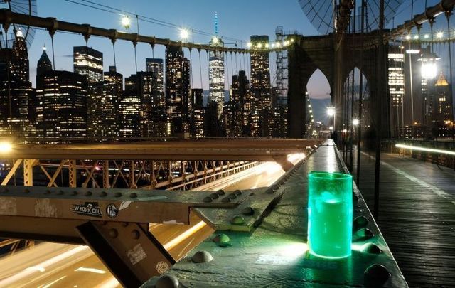 A green light for the Irish Diaspora shining on the Brooklyn Bridge in NYC.