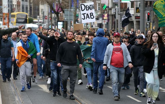 Protesters supporting a worldwide day of opposition to Covid-19 lockdowns marched in Dublin on March 20, 2021.