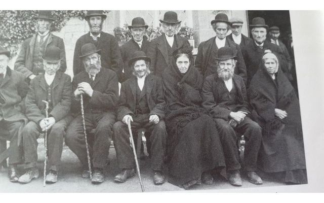 Athlone, 1909: Group receiving their old age pension.