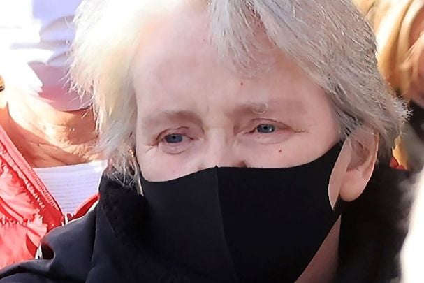 October 30, 2020: Anne O\'Sullivan watches the hearses depart after the funeral of her son Diarmuid O’Sullivan and husband Tadg O\'Sullivan.