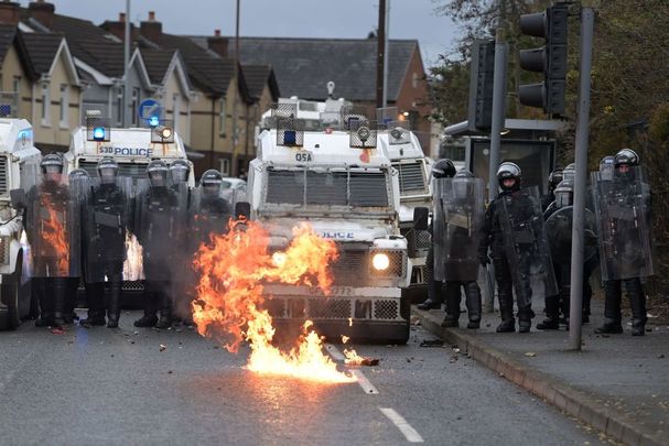 Nationalist attacking the police on Springfield Road, Belfast, close to the Peace Wall.