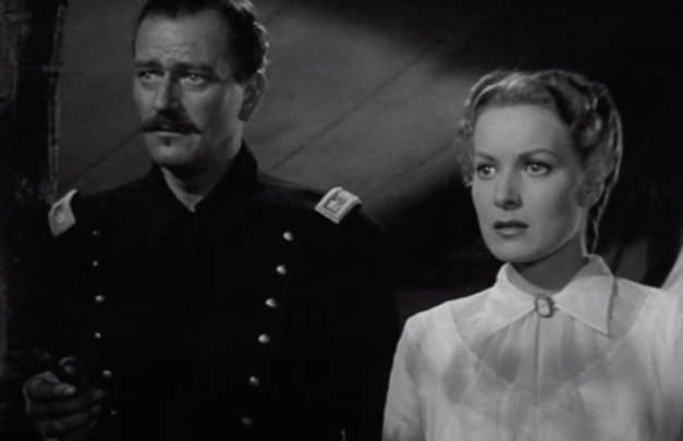 John Wayne and Maureen O\'Hara listening to \"I\'ll Take You Home Kathleen\" in the John Forde movie, \"Rio Grande\".