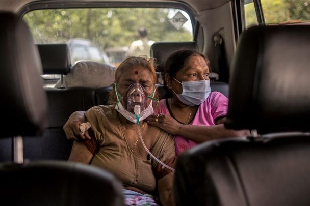 April 24, 2021: Patients who are infected with Covid-19 coronavirus can be seen wearing oxygen masks as free oxygen was supplied as a part of public service for the people in need by a Gurdwara or a Sikh Holy place amid the rising concerns over lack of oxygen in New Delhi, India.
