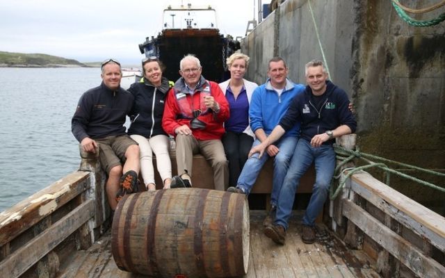 The O\'Grady family onboard the Dolphin, which is maturing single malt Irish whiskey at sea. 