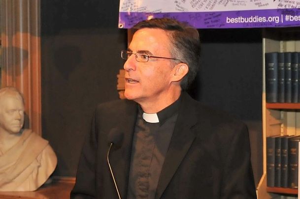 October 17, 2014: Father Kevin O\'Brien speaks on stage at the 2014 Audi Best Buddies Challenge VIP Reception at Georgetown University in Washington, DC. 