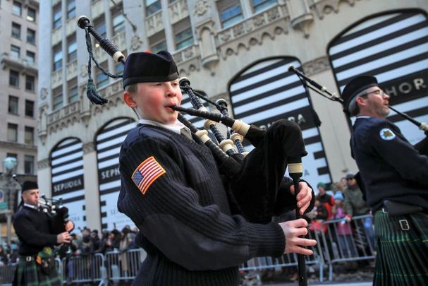 March 17, 2017: Members of the Xaverian High School Pipe and Drum band from Brooklyn march along 5th Avenue during the annual St. Patrick\'s Day parade in New York City. The New York City St. Patrick\'s Day parade, dating back to 1762, is the world\'s largest St. Patrick\'s Day celebration. 