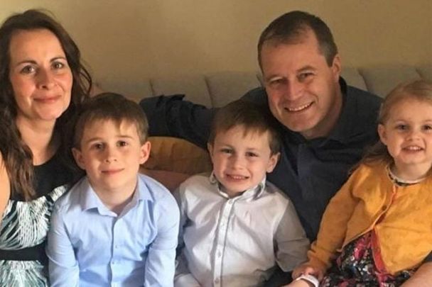 Deirdre Morley, Andrew McGinley, and their three children.