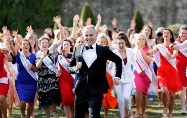 Dáithí Ó Sé, center, has been the host of the Rose of Tralee Festival in recent years.