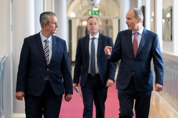 June 3, 2021: Edwin Poots (left) and Micheál Martin (right) walk ahead of Paul Givan (center) who is expected to become Northern Ireland\'s next First Minister. 