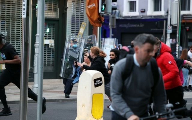 Gardaí baton charge a crowd on South William Street in Dublin City. 