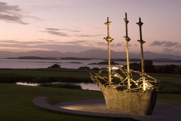 A statue of a \"coffin ship\": Ireland\'s National Famine Memorial, near Murrisk, County Mayo.