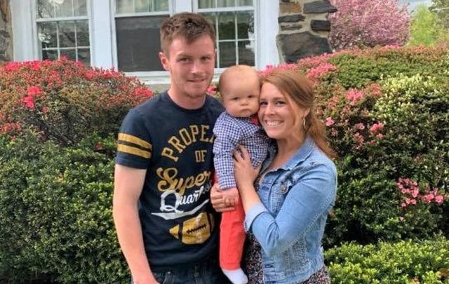 Sean Hughes with his wife Emily and their son Sean.